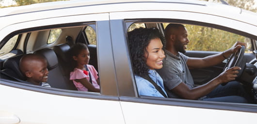 Young Family in Car