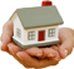 Cupped hands holding a house