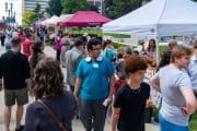 People shopping at a farmers market