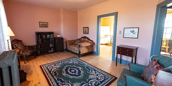 Vintage furniture set up to demonstrate how lighthouse keepers may have lived.