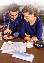 Young couple working on their finances
