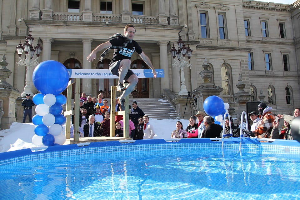 Lt. Gov. Brian Calley takes the polar plunge.