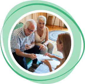 Woman showing paper to senior couple