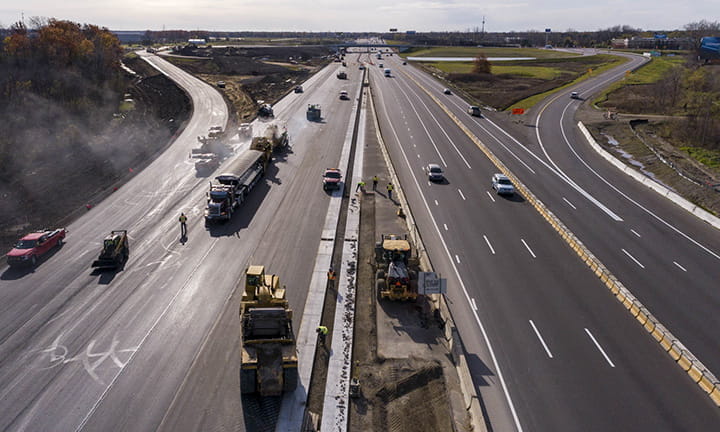 Aerial shot of a divided highway undergoing median work