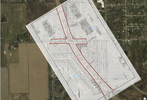 Aerial view of a ROW map over a terrain view of the same location.