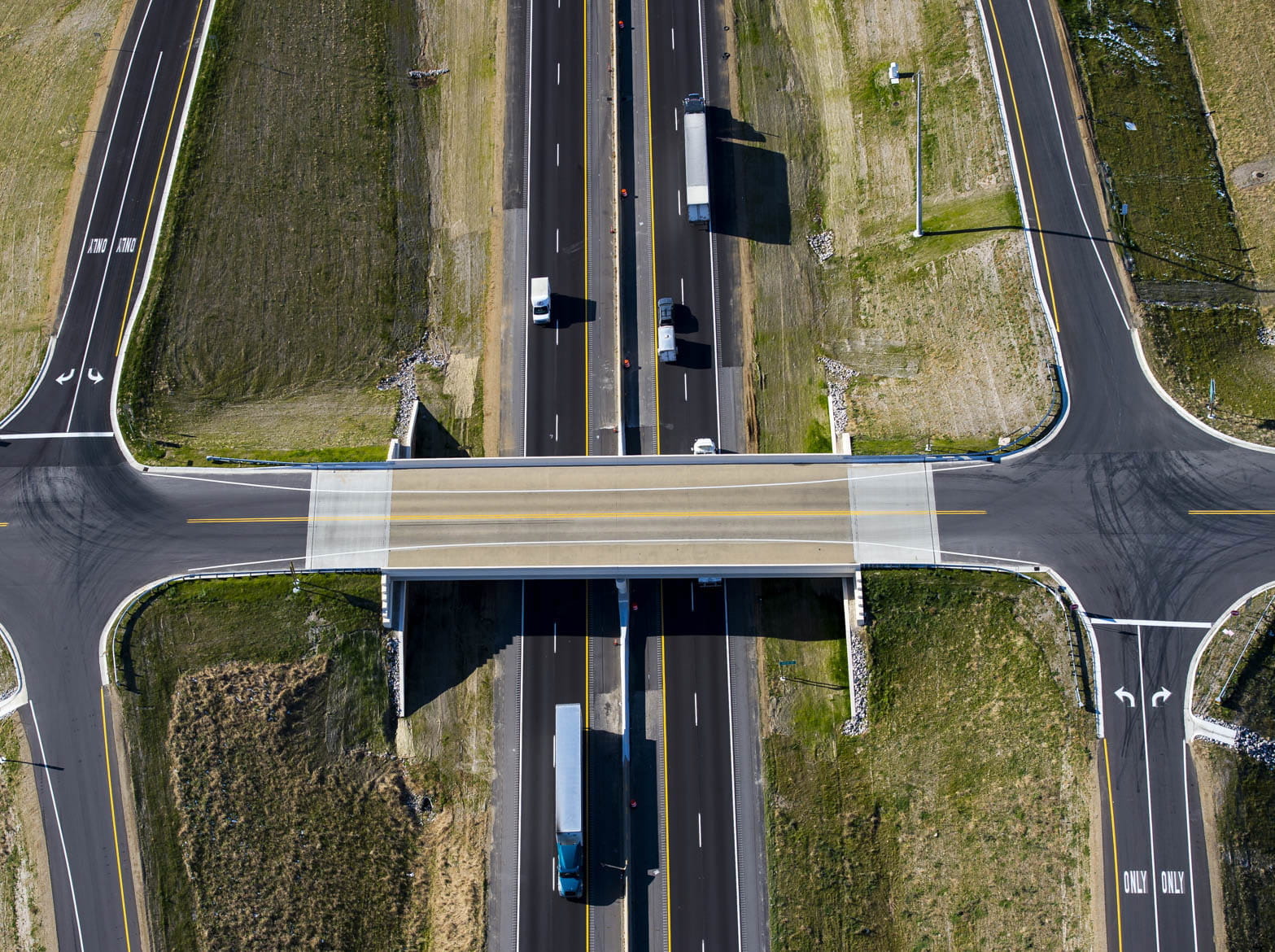 Aerial shot of a highway overpass.