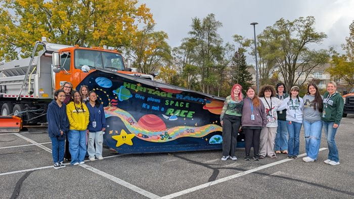 Heritage High School art students proudly unveiled their creative design for MDOT’s 2025-2026 Paint the Plow program.