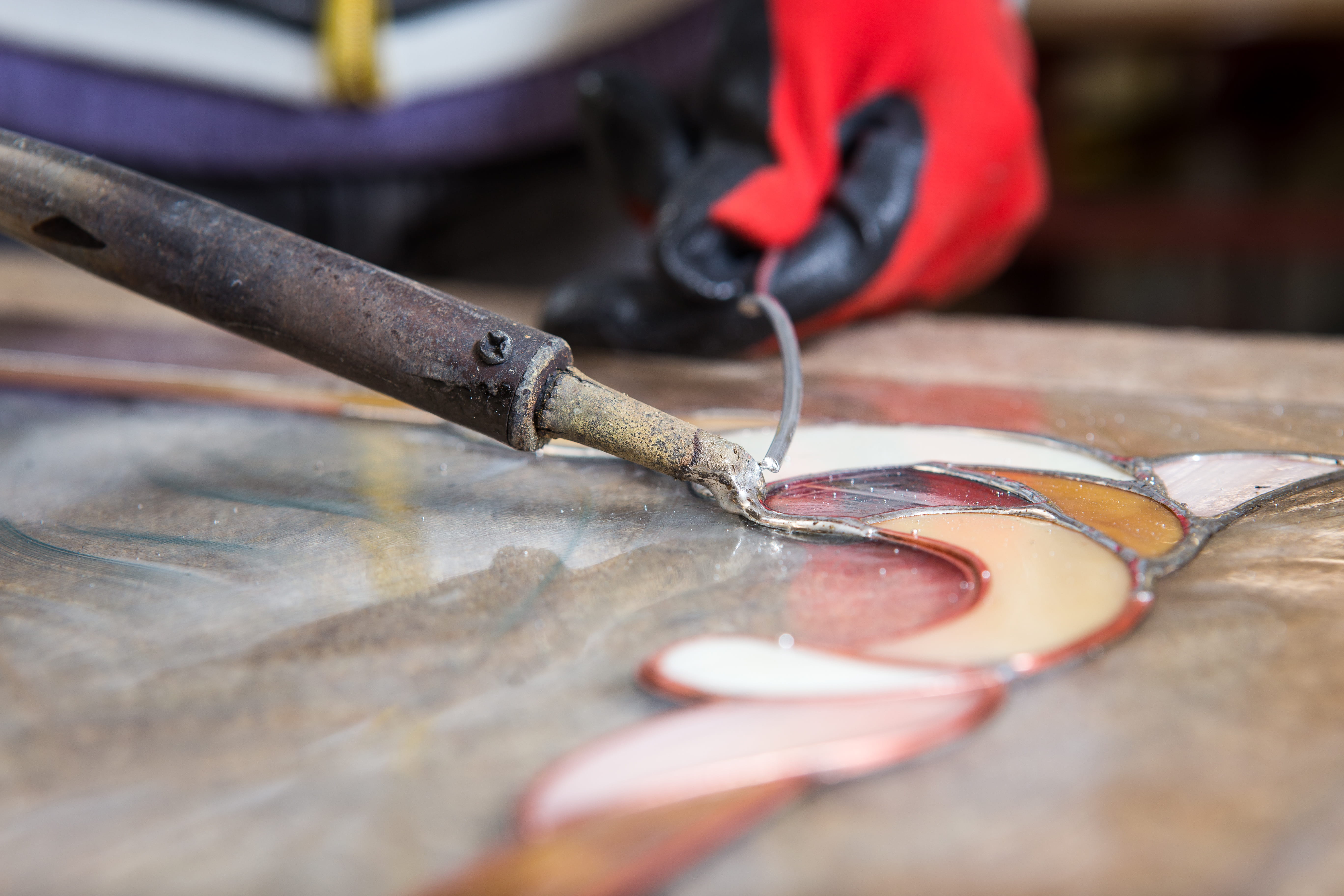 Stained glass making using a tool