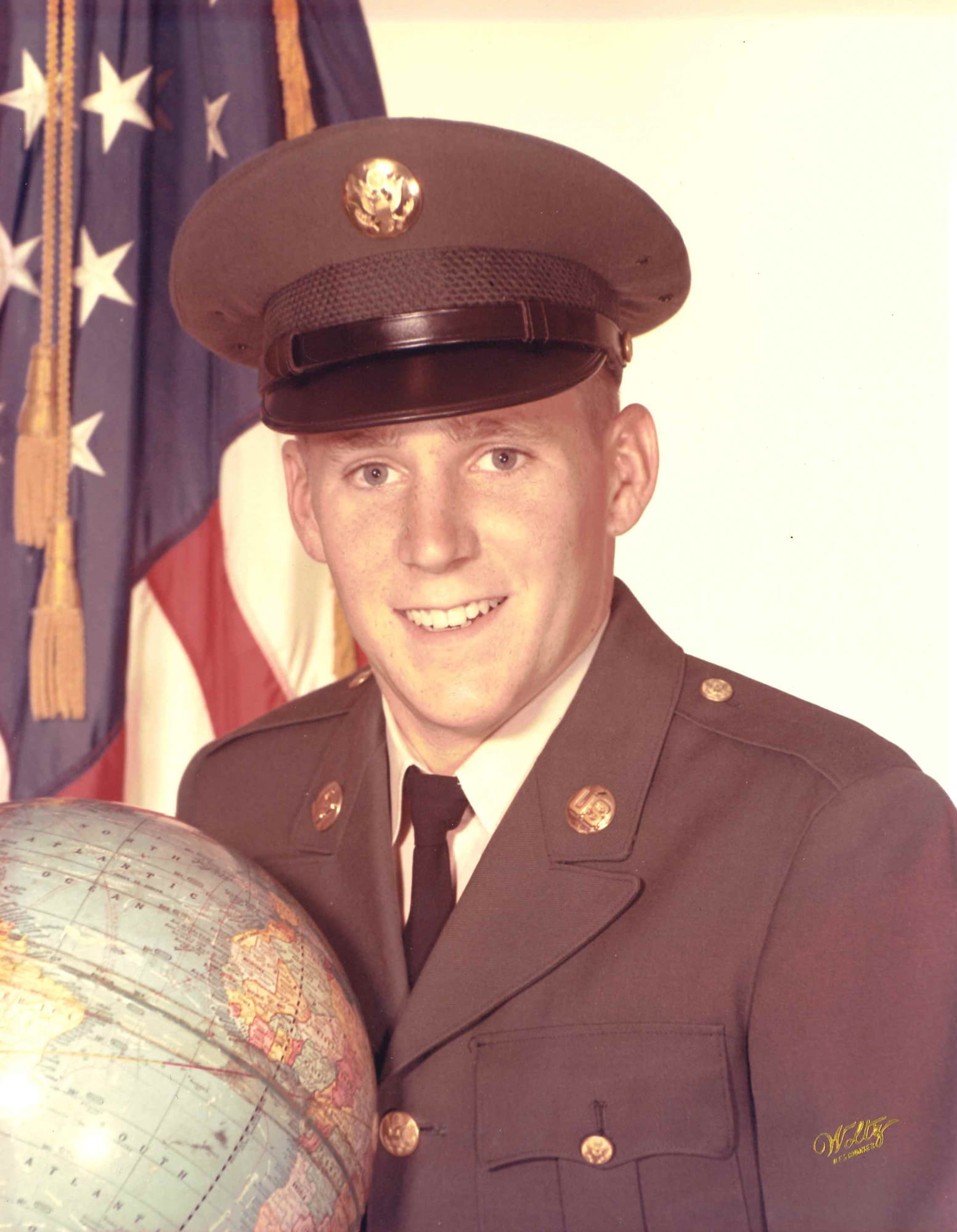 light-skinned man wearing uniform