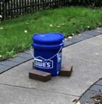 Bucket placed outside during a rain event in Saginaw to collect rain samples to be tested for the presence of PFAS.